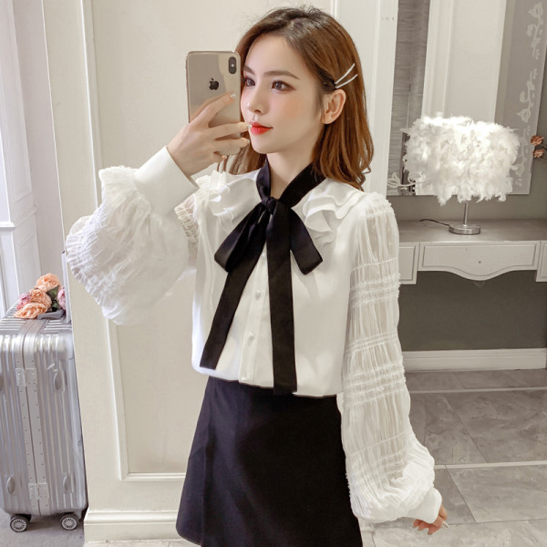 Moderna ženska košulja s vezama i širokim rukavima