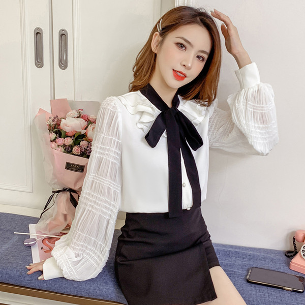 Moderna ženska košulja s vezama i širokim rukavima