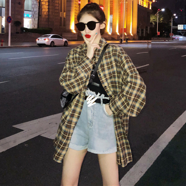 Rūtains sieviešu krekls ar apdruku mugurpusē