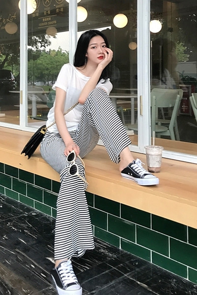 Platas sieviešu svītrainas bikses ar augstu vidukli