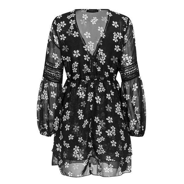 Vabaaja naiste lühike kleidi väljalõikega mudel pikkade varrukatega ja lillemustriga