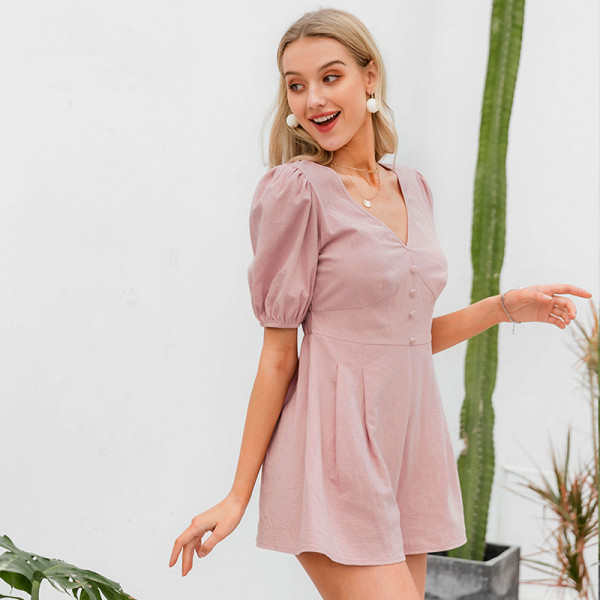 Moteriškas laisvalaikio kombinezonas trumpomis rankovėmis ir sagomis