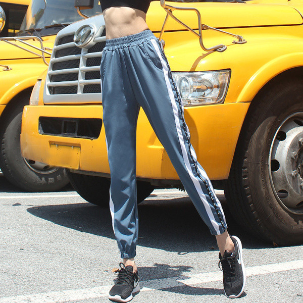 Pantaloni sport dama cu margini laterale si talie elastica