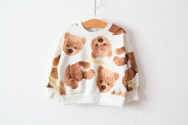 Vaikiška palaidinė su ovalia iškirpte ir raštu mergaitėms