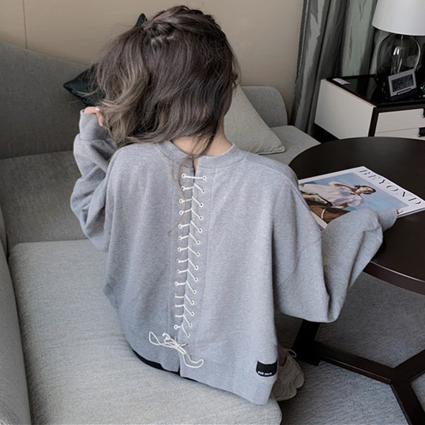 Sieviešu blūze ar garām piedurknēm un saitēm