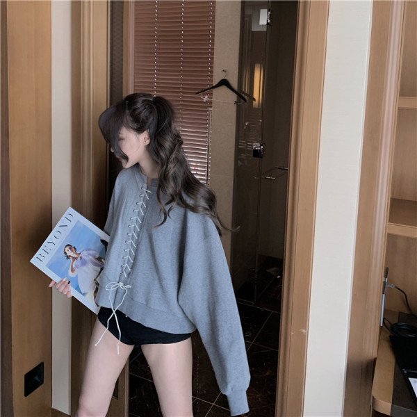 Sieviešu blūze ar garām piedurknēm un saitēm