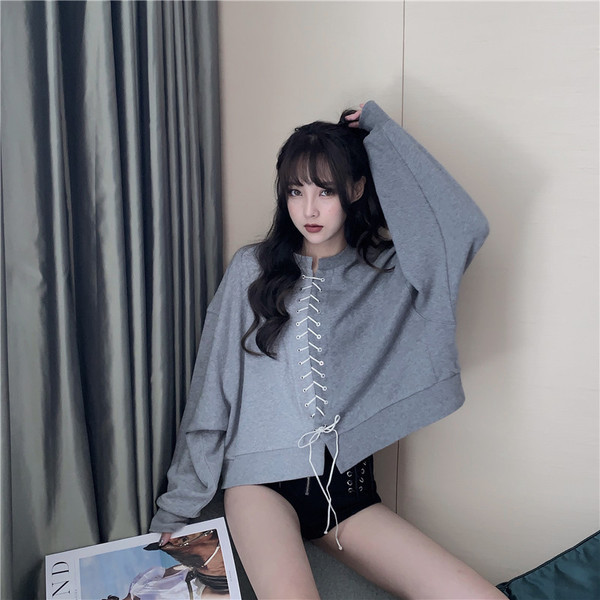 Sieviešu blūze ar garām piedurknēm un saitēm