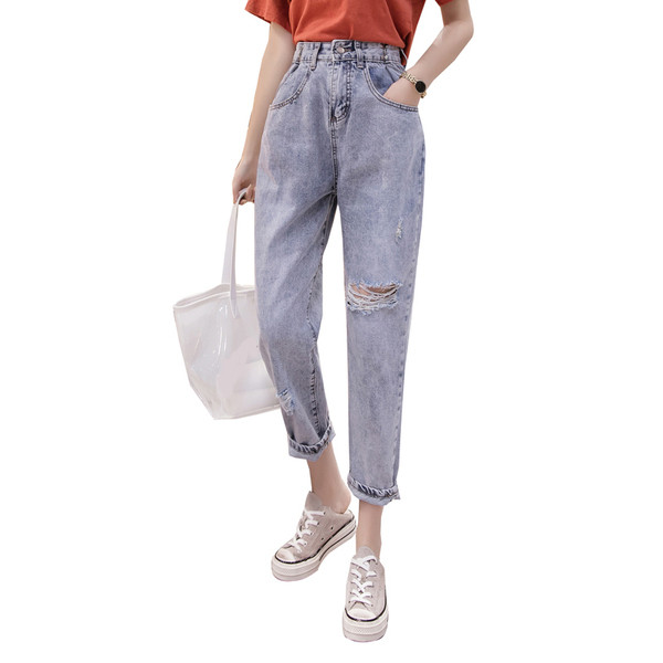 Moteriški platūs džinsai su plėšytais motyvais ir aukštu juosmeniu
