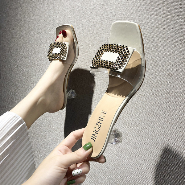 Naiste moodsad paksu kontsa ja metallist pandlaga sussid