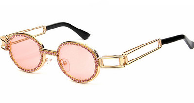 Modernas sieviešu brilles ar apaļām lēcām un dekorācijas akmeņiem