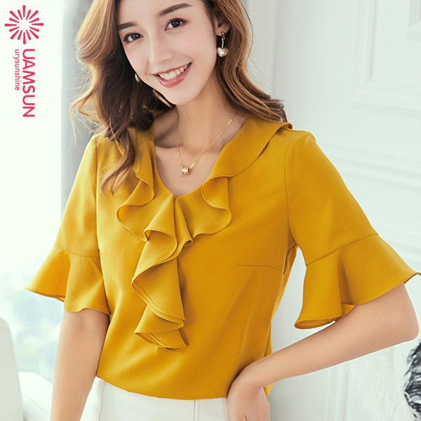 Bluză de damă elegantă cu mâneci 3/4 și decolteu oval potrivită primăverii