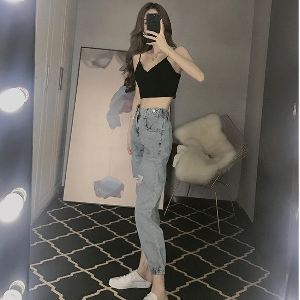 Elastsete ja rebenenud motiividega vabaaja naiste teksad