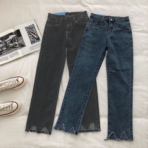 Kõrge vöökoha ja rebenenud motiividega vabaaja teksapükste sirge mudel