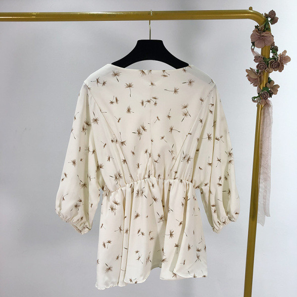 Naiste lai elastse vöökoha ja nööpidega pluus