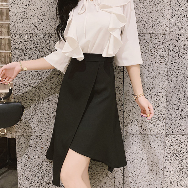 Naiste vabaaja seelik kõrge vöökohaga - must asümmeetriline mudel