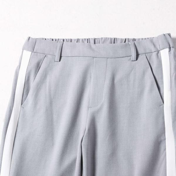 Modern női alkalmi nadrág gumírozott derékkal és szegéllyel