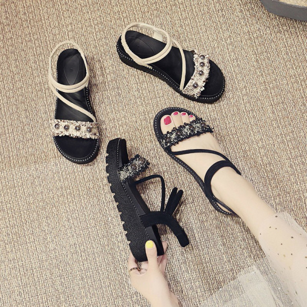 Alkalmi női szandál lapos magas talppal