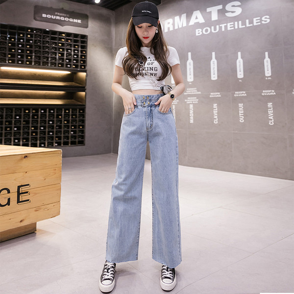 Moteriški laisvalaikio ilgi džinsai - platus mėlynos spalvos modelis