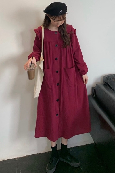 Széles női retro ruha gombokkal és zsebekkel