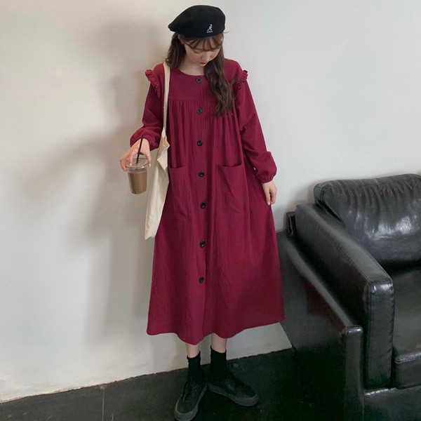 Széles női retro ruha gombokkal és zsebekkel