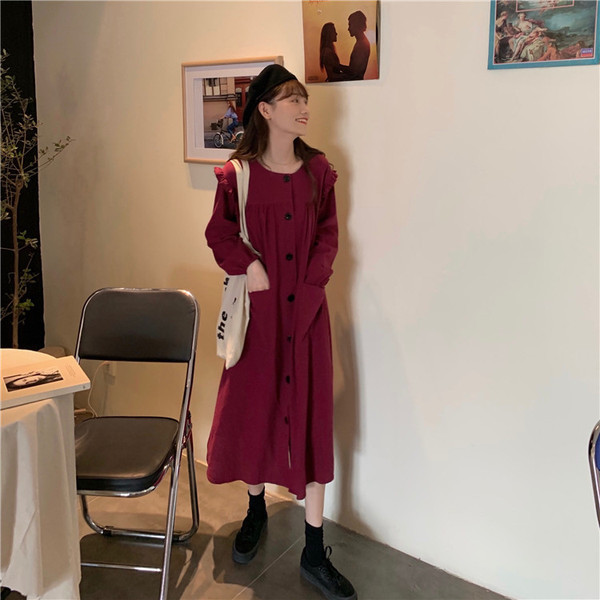 Széles női retro ruha gombokkal és zsebekkel