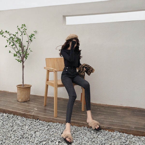 Upijene ženske crne traperice s visokim strukom i gumbima