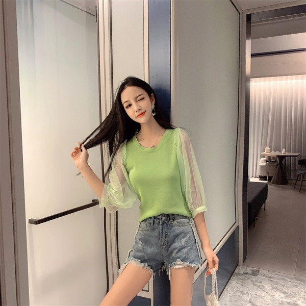 Új modell női pulóver ovális nyakkivágással és pecsét ujjakkal