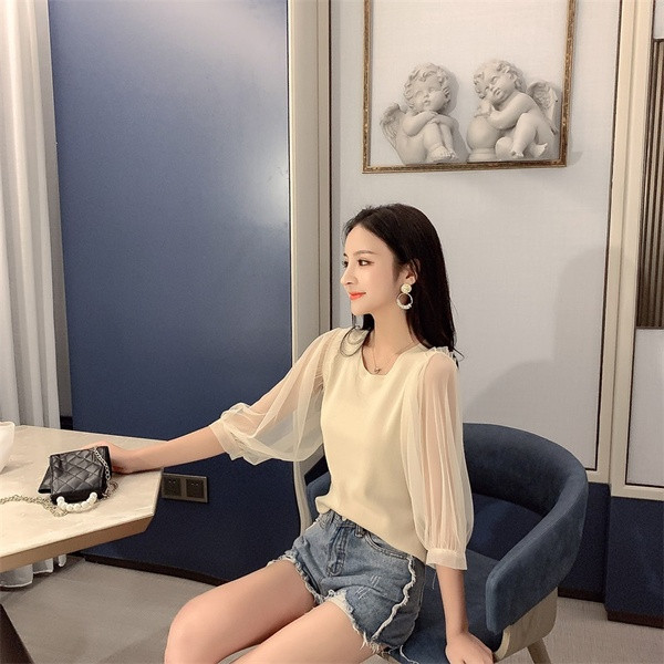 Új modell női pulóver ovális nyakkivágással és pecsét ujjakkal