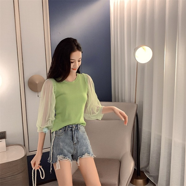 Új modell női pulóver ovális nyakkivágással és pecsét ujjakkal