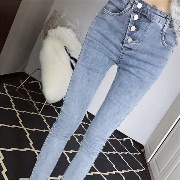 Női testreszabott farmer aszimmetrikus rögzítéssel