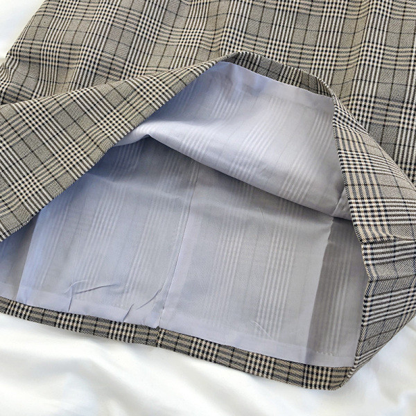 Smeđa ženska karirana suknja visokog struka