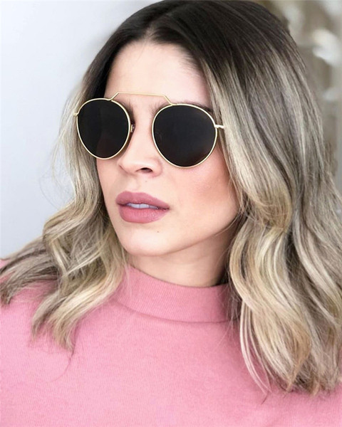 Stiilsed naiste päikeseprillid õhukese raami ja ümara klaasiga