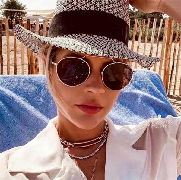 Stiilsed naiste päikeseprillid õhukese raami ja ümara klaasiga