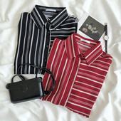 Platūs dryžuoti moteriški marškiniai su klasikine apykakle ir sagomis