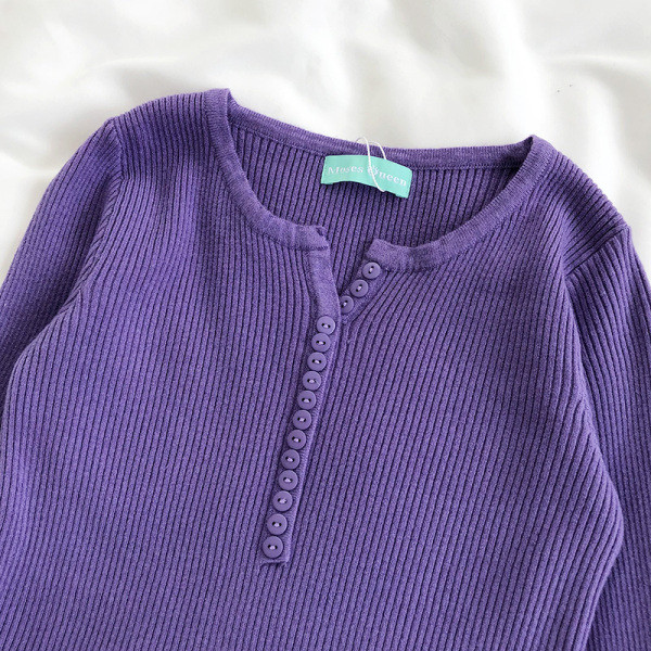 Ležerna ženska pripijena bluza s gumbima