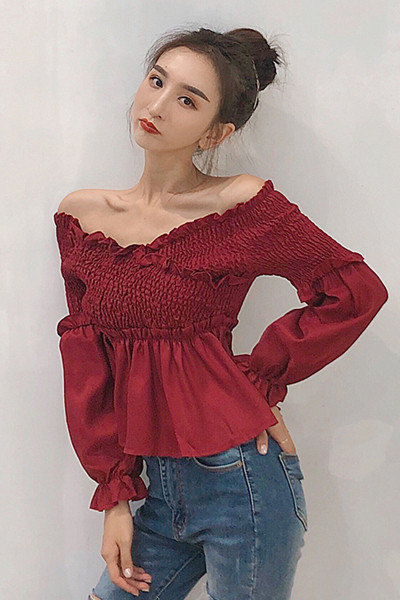 Ženska elastična bluza s dugim rukavima i V izrezom