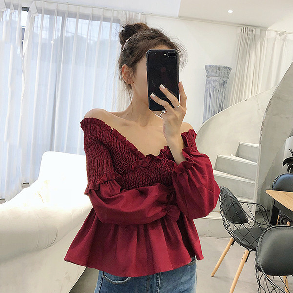 Ženska elastična bluza s dugim rukavima i V izrezom