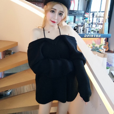 Platus moteriškas megztinis su nuleistomis rankovėmis ir kaklaraiščiais