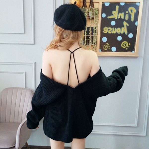 Platus moteriškas megztinis su nuleistomis rankovėmis ir kaklaraiščiais