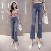 Női alkalmi farmer magas derékkal, szakadt mintával, kék színben