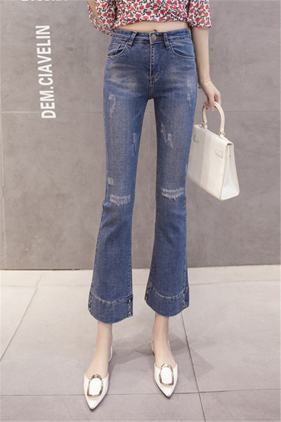 Női alkalmi farmer magas derékkal, szakadt mintával, kék színben