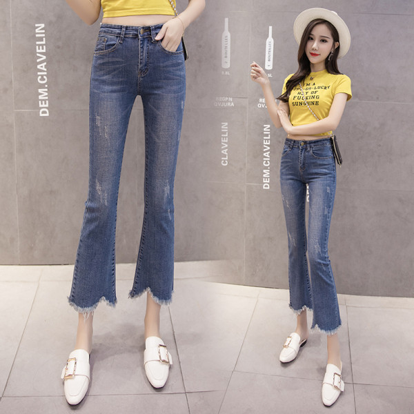 Női alkalmi farmer magas derékkal, szakadt mintával, kék színben