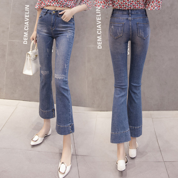 Női alkalmi farmer magas derékkal, szakadt mintával, kék színben