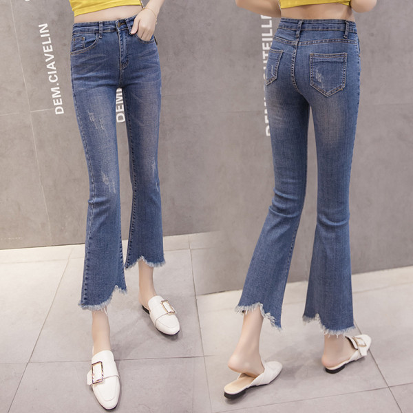 Női alkalmi farmer magas derékkal, szakadt mintával, kék színben