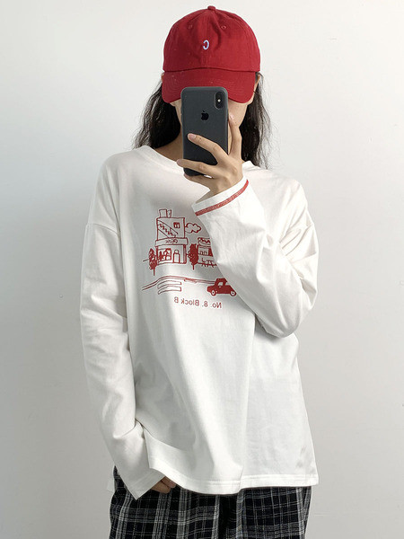 Széles női blúz, hosszú ujjal és mintával