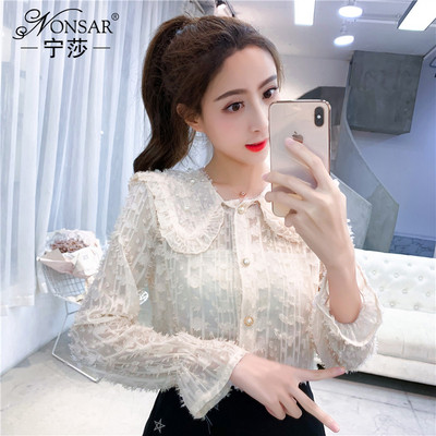 Stilingi retro stiliaus moteriški marškiniai su sagomis ir ilgomis rankovėmis