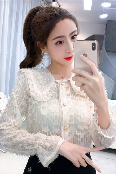 Stilingi retro stiliaus moteriški marškiniai su sagomis ir ilgomis rankovėmis