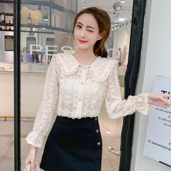 Stilingi retro stiliaus moteriški marškiniai su sagomis ir ilgomis rankovėmis