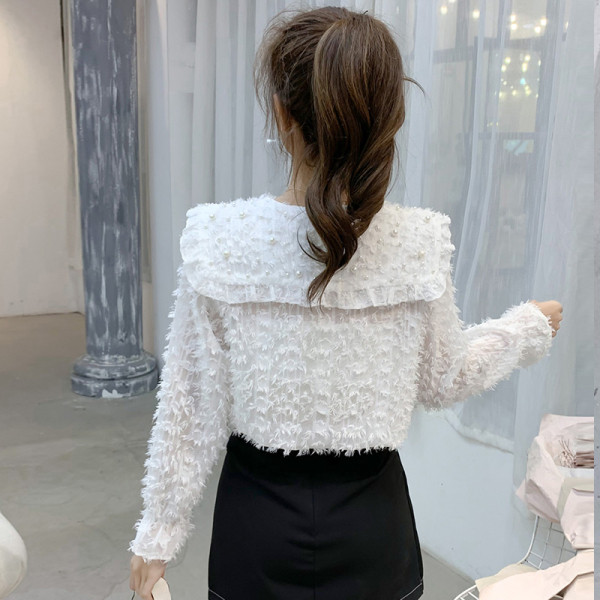 Stilingi retro stiliaus moteriški marškiniai su sagomis ir ilgomis rankovėmis