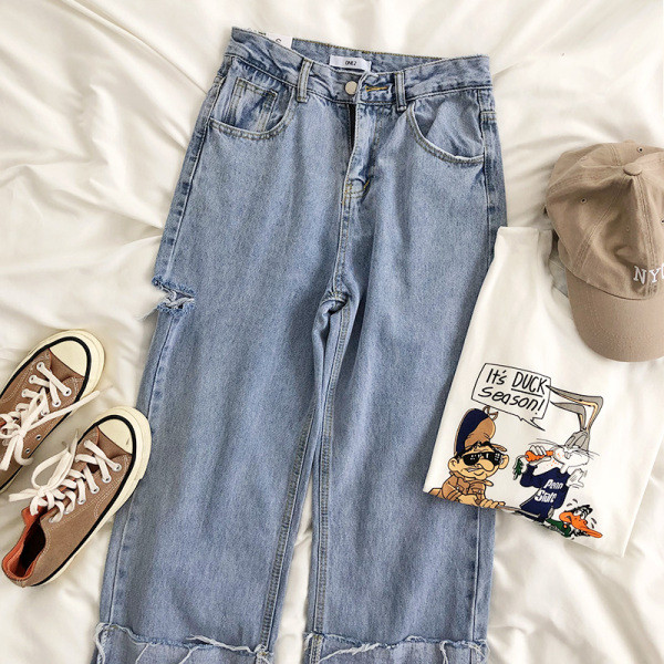 Blugi de dama cu motive rupte si talie inalta - model larg